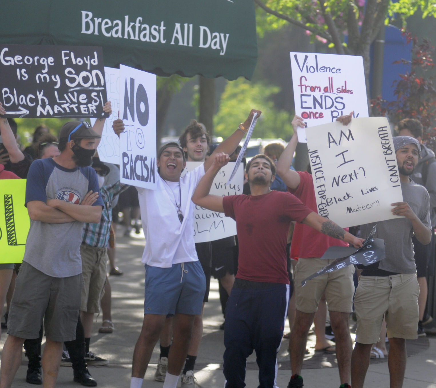 Demonstrators chant "Black Lives Matter"
